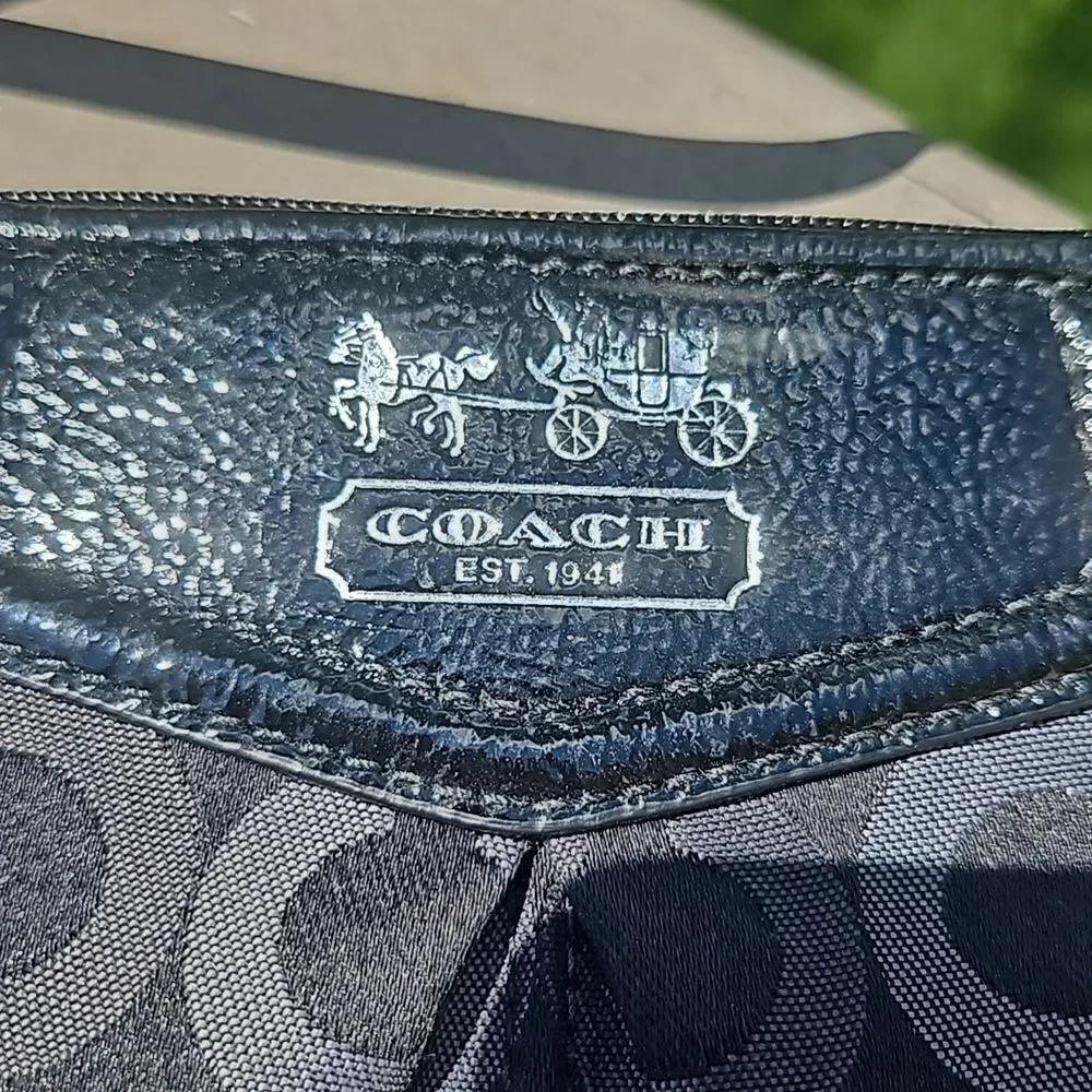 Coach Op Art logo wristlet